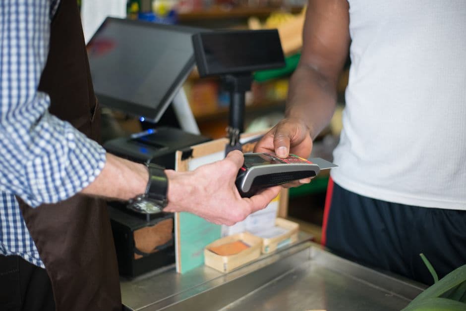 Grocery shop counter with a till running free POS software