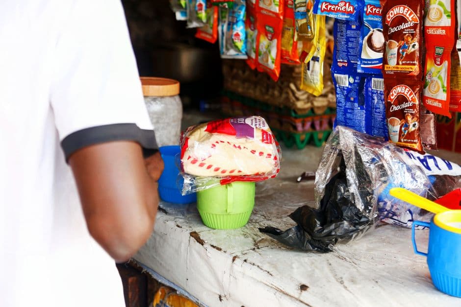 Local shop counter displaying packaged groceries and goods