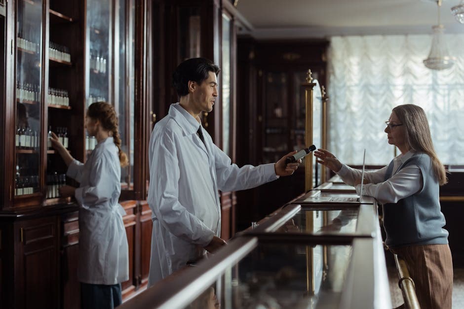 Pharmacist serving a customer at the pharmacy counter