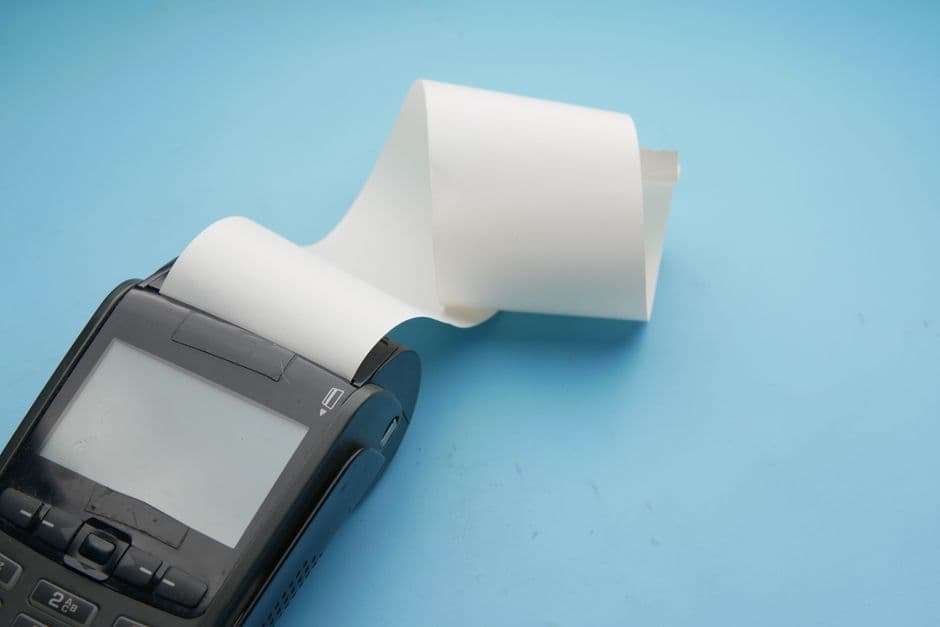 Fiscal receipt printer at a business counter in Tanzania